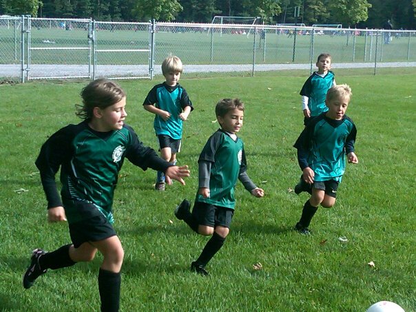 Kids playing soccer